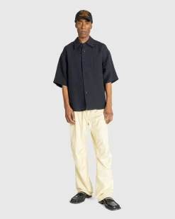 Auralee Hard Twist Polyester Satin Laminate Field Pants Light Beige- Pants