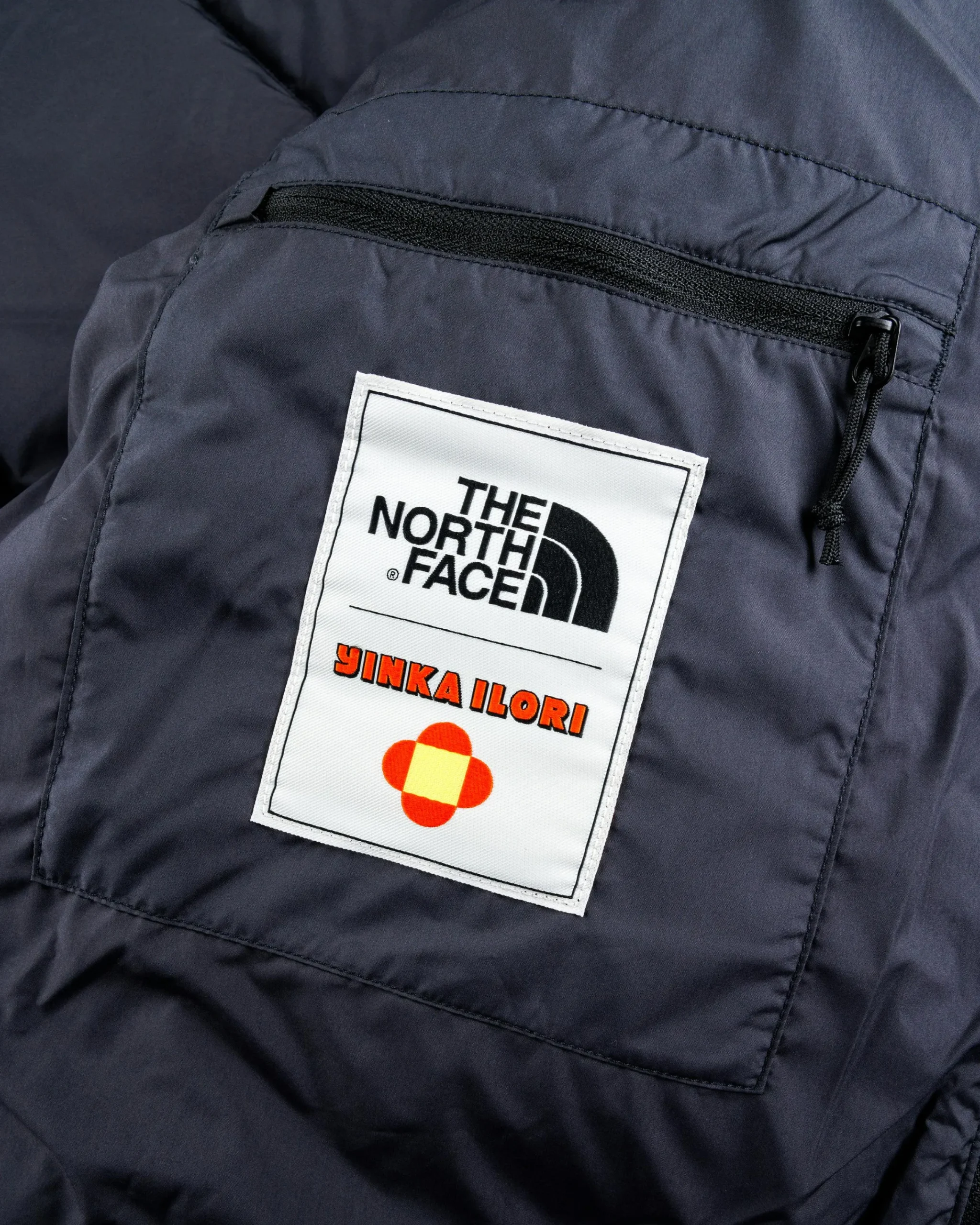 The North Face M TNF x Yinka Ilori Down Puffer Jacket TNF Black/Asphalt Grey- Outerwear