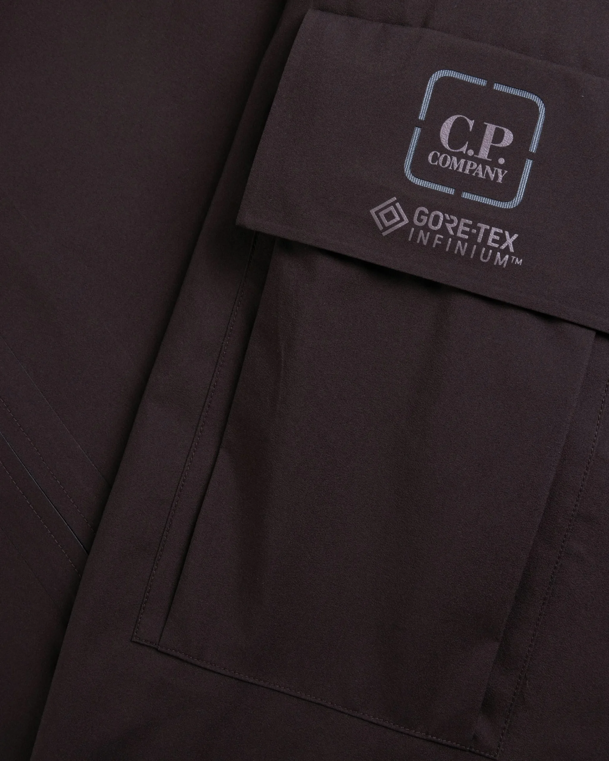 C.P. Company Metropolis Series GORE-TEX 3L INFINIUM Anorak Rum Raisin- Outerwear